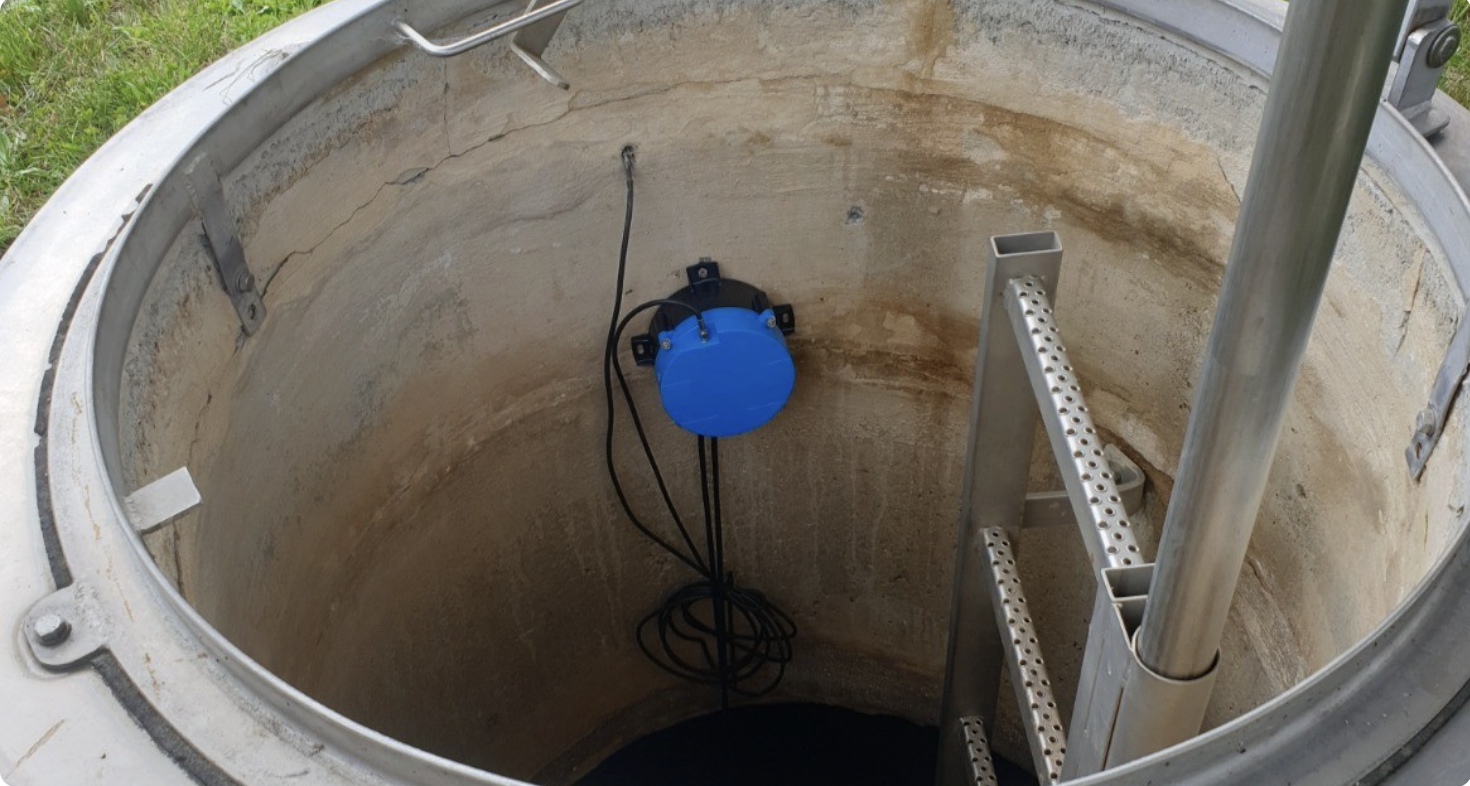 AQ IoT data logger installed inside a street manhole for water network monitoring